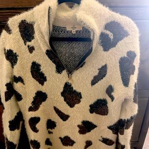 Women’s size Medium zip up sweater.